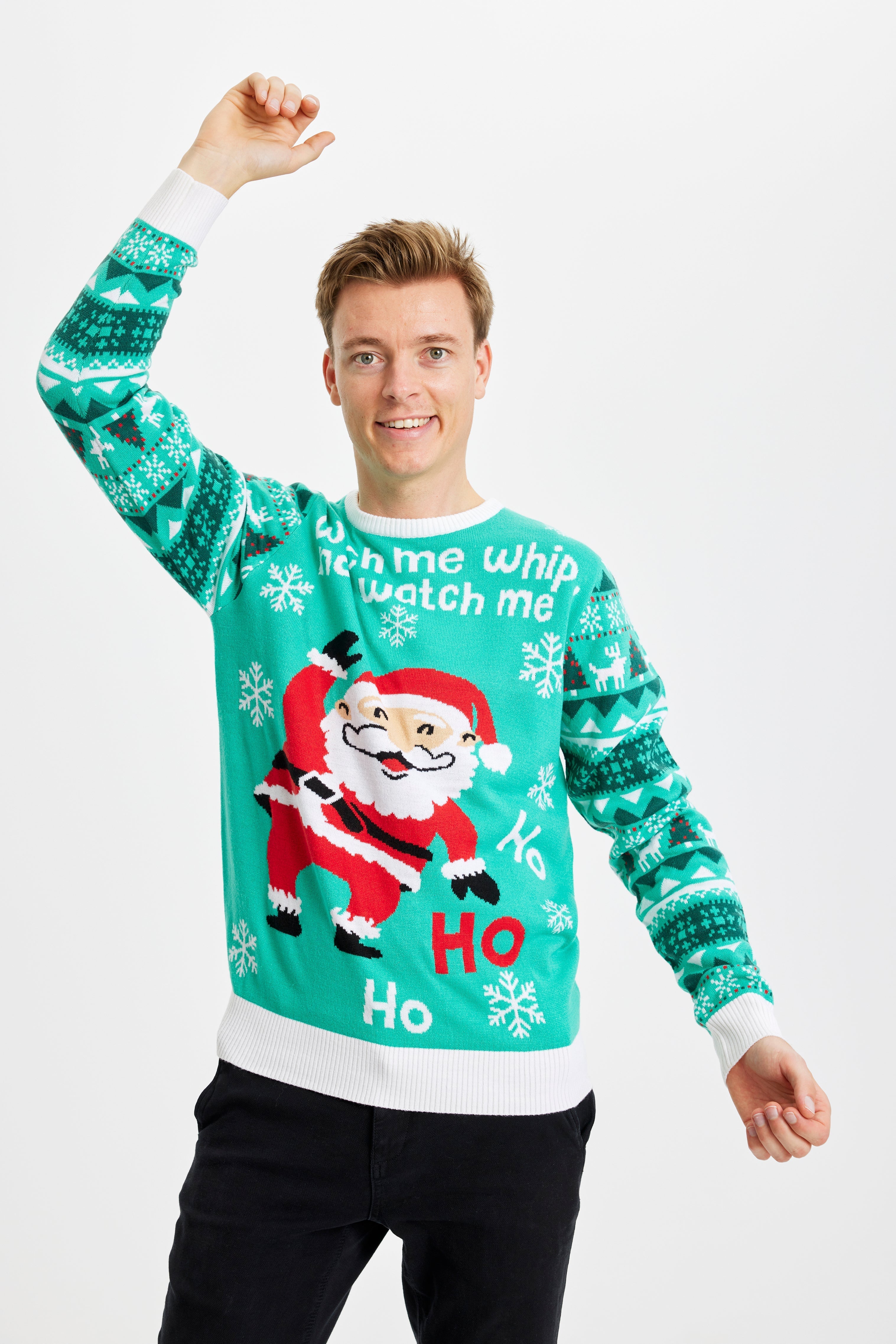 Ein Mann, der einen türkisfarbenen Weihnachtspulli mit dem Spruch